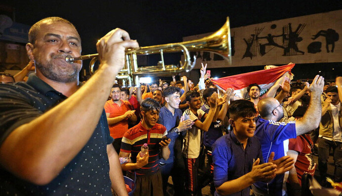 Зі сльозами на очах: емоційні фото, як війська Іраку зустрічали в Мосулі