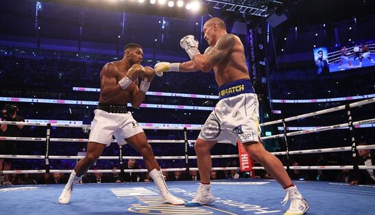 Схопи за яйця та вирви горлянку: легендарний боксер дав пораду Джошуа, як побити Усика