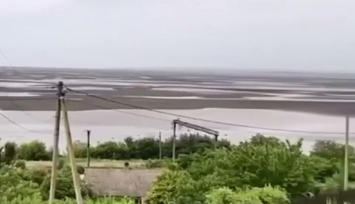 Таким, как раньше, уже не будет: кадры Каховского водохранилища до и после взрыва ГЭС