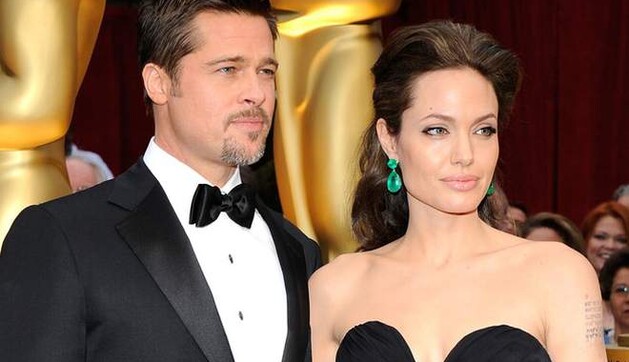 Анджелину Джоли с мужем в России использовали для рекламы надгробий