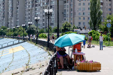 Як Київ переносить велику спеку, - найяскравіші фото