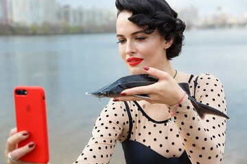 Даша Астафьева наполнила воды Днепра царской рыбой