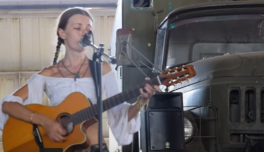 Украинская группа презентовала в зоне АТО трогательную песню о любви отца и сына: опубликовано видео