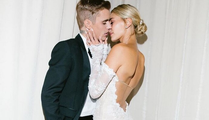 Роскошное платье, кольца и поцелуи: Джастин и Хейли Бибер показали новые свадебные фото