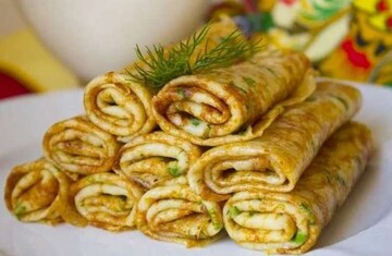 Апетитні млинці з сиром і зеленню на Масляну: простий рецепт і варіанти за інгредієнтами