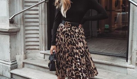 Як і з чим носити спідницю-міді цього літа: 7 стильних образів на кожен день