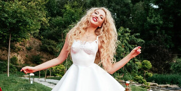 Оля Полякова показала сталевий прес і відповіла на питання про свою фігуру