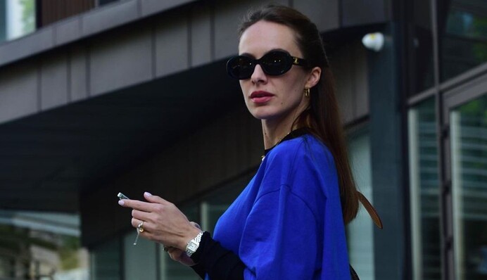 Жити не перестану: дружина Остапчука відповіла на критику через безтурботні фото у красивому одязі