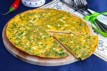 Як приготувати сирний омлет із зеленню: простий рецепт на сковороді