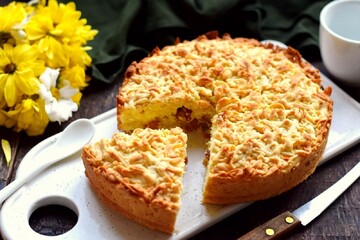 Никогда не надоест: рецепт тертого пирога с нежной творожной начинкой