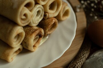 Налисники з сиром - класична страва на Масляну: як їх приготувати