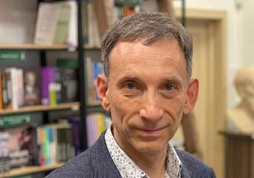"Шкарпетки - це топ": Віталій Портников опублікував фото з гантелями та викликав фурор