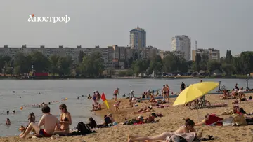 Київ під палючим сонцем: як містяни рятувалися від спеки до +37 — фоторепортаж